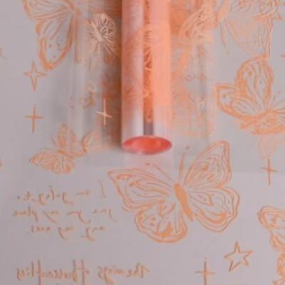 Пленка упаковочная прозрачная с рисунком для цветов и подарков в рулоне Бабочки 70 см Оранжевый пастель 621930