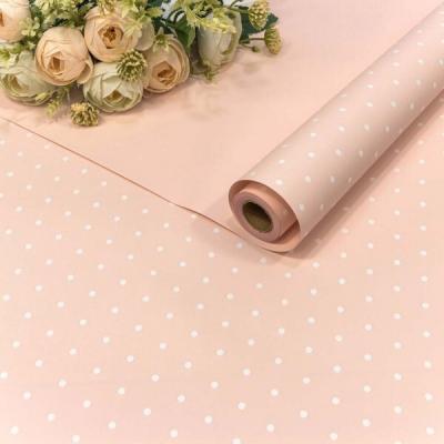 Плёнка флористическая матовая в рулоне 58 см*10 м Мелкий горошек розовый 447507