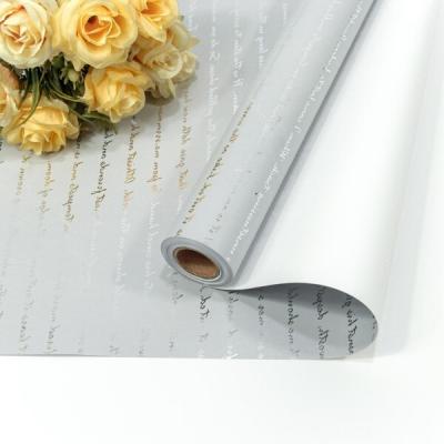 Плёнка флористическая матовая в рулоне с серебристой печатью 58 см*10 м Серый/белый 65 мкм 441673