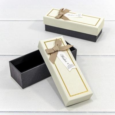Подарочная коробка прямоугольник 12*4.5*3.5 см Бежевый/черный с бантом 441616, цена за шт
