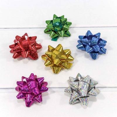 Бант-звезда 6.3 см На липучке голография (микс) 40 шт/уп 441643 ЦЕНА ЗА УПАКОВКУ