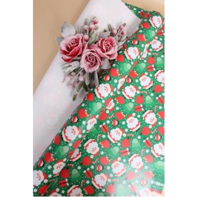 Бумага упаковочная новогодняя глянцевая 70*100 см Краснощекий Дед Мороз на зеленом 10 л/уп 568024
