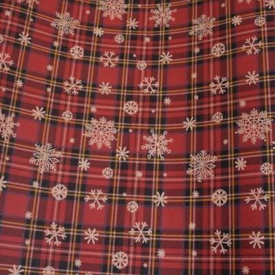 Бумага упаковочная новогодняя крафт 70*100 см Снежинки и шотландка 10 л/уп 568022