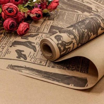 Крафт бумага в рулоне 70 см*0.5 кг с рисунком Газета 44356