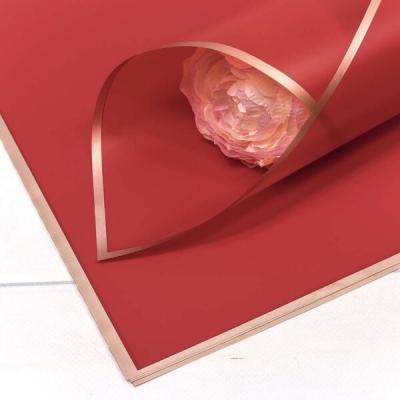 Пленка флористическая матовая в листах 60*60 см С золотым краем красный 20 л/уп 447598