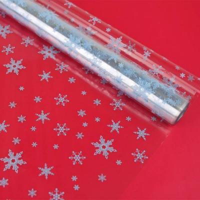 Пленка упаковочная новогодняя в рулоне с рисунком Снежинки NEW 70 см*7.8 м голубой