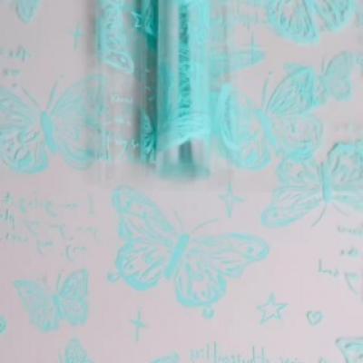 Пленка упаковочная прозрачная с рисунком для цветов и подарков в рулоне Бабочки 70 см Мятный 621929