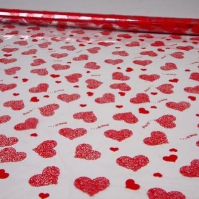 Пленка упаковочная прозрачная с рисунком для цветов и подарков в рулоне Сердца Love is 70 см Красный
