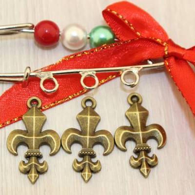 Подвеска металлическая 'Королевская лилия'23*15мм (уп.20шт)